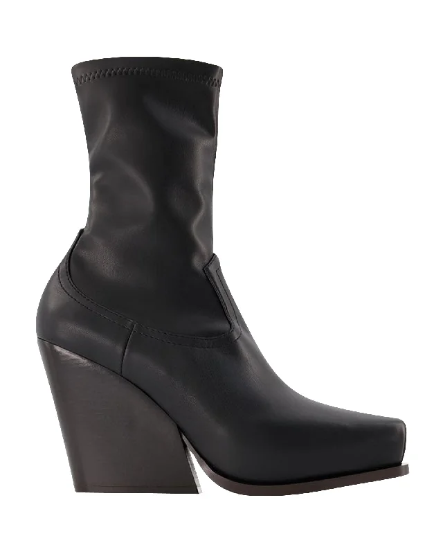 Cowboy Boots in Black Synthetic Leather